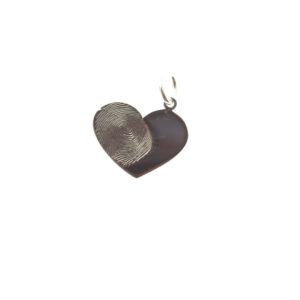 Dije de plata corazón con huella